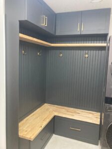 Modern mudroom with wooden accents handyman in Denver